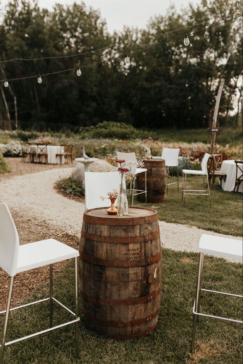 Instead of a sitdown wedding we had an appetizer cocktail hour before our sunset ceremony. #weddingideas #weddinginspiration #cocktailhour #weddingreceptionideas #weddingdecor #barrel #copperwedding #farmstylewedding #flowerfarm #flowers Wine Barrel Table Wedding, Barrel Party Decor Ideas, Farm Wedding Cocktail Hour, Wedding Flowers Wine Barrels, Cocktail Hour Backyard Wedding, Wine Barrel Cocktail Table Wedding, Wine Barrell Ideas Wedding, Barrel Cocktail Tables, Wedding Cocktail Hour Flowers