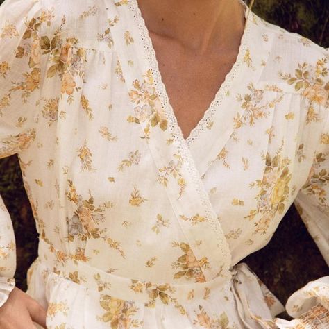 Oak Meadow on Instagram: "Up close with our most adored new style ~ The Clara wrap dress 💫 ⠀⠀⠀⠀⠀⠀⠀⠀⠀ 🌱 Made from lush plant based fabric ❤️ Featuring the cutest lace trim detailing 🌸 Hand painted print exclusive to Oak Meadow ⠀⠀⠀⠀⠀⠀⠀⠀⠀ Our Clara wrap dress is full of romance and we just love her! Shop Online or visit our Byron Bay boutique." Cottagecore Day Dress With Lace Trim, Cottagecore Daywear Dress With Lace Trim, Cottagecore Vintage Lace Dress With Lace Trim, Cottagecore Prairie Dress With Lace Trim And Long Sleeves, Cottagecore V-neck Dress With Lace Trim, Whimsical Cottagecore, Oak Meadow, Dress With Lace Trim, Dress With Lace