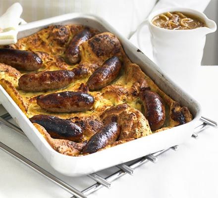 A British classic. Meaty sausages enveloped in crispy batter, plus, a special onion gravy to really top it off. We think it's better than mum's! Best Macaroni And Cheese, Toad In The Hole, Onion Gravy, Bbc Good Food, Bbc Good Food Recipes, English Food, British Food, Food Experiences, Food Shows