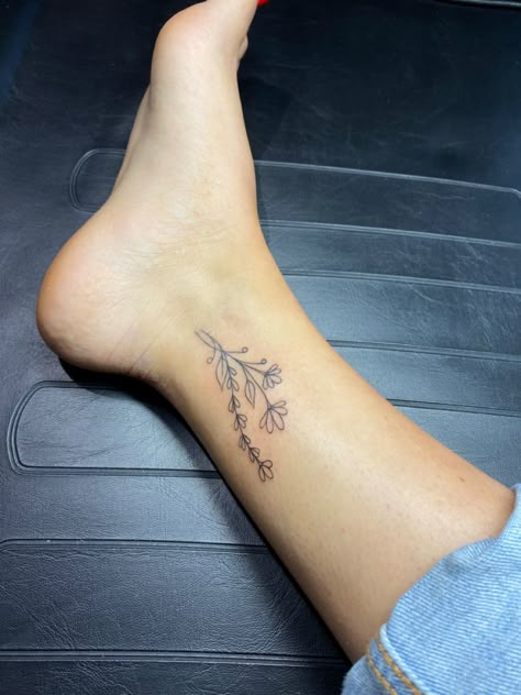 Inner Ankle Tattoos For Women Words, Flower Tattoo Inside Ankle, Tattoo On Inside Of Ankle, Inside Of Ankle Tattoo, Side Of Ankle Tattoo, Ankle Tattoo Placement Ideas, Inside Of Foot Tattoo, Flowers On Ankle Tattoo, Side Ankle Tattoo