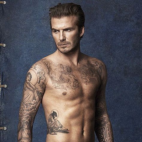 15 Sexy Stars Who Are Covered in Tattoos: There's nothing quite like a guy with tattoos — the sight of a chiseled physique completely covered in ink can really get you going, right? David Beckham Tattoos, David Beckham Haircut, Beckham Haircut, Covered In Tattoos, David Beckham Hairstyle, Beckham Hair, Celebrity Tattoos, Tattoo Sleeve Men, Men Style Tips