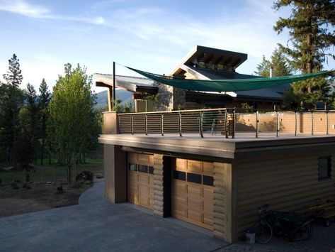 Rooftop deck over garage with sail shades and cable railings Deck Over Garage, Garden School, Modern Log Cabin, Large Backyard Landscaping, Custom Railing, Garage Roof, Carport Designs, Pergola Lighting, Roof Architecture