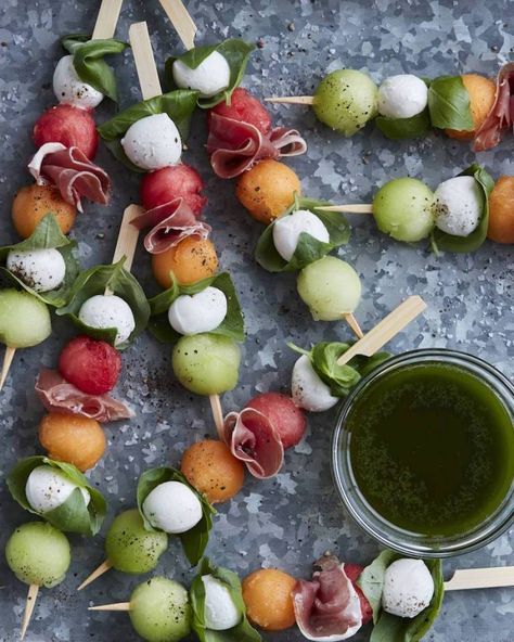 Melon Caprese Skewers | These spring garden party recipes are light and refreshing and perfect for any outdoor entertaining. With the warmth of spring and all the flowers blooming throwing a garden party is the best way to embrace the new season. These simple garden party recipes are something anyone can make and impress your guests. #xokatierosario #springdinnerideas #gardenpartyfood #easypartyrecipes Healthy Picnic Foods, Healthy Picnic, Garden Party Recipes, Summer Appetizers Easy, Whats Gaby Cooking, Caprese Skewers, Spring Garden Party, Summer Appetizer, Picnic Food