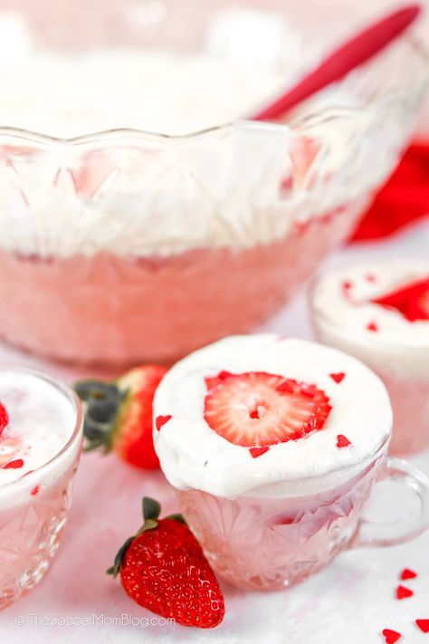 Cupid's Valentine Punch is a festive holiday punch perfect for Valentine's Day parties. Directions for both a boozy version and non-alcoholic punch are included! Strawberry Ice Cream Punch Recipes, Valentine’s Day Punch Alcoholic, Strawberry Ice Cream Punch, Valentines Punch Alcohol, Valentine’s Day Punch, Valentine Punch Recipe, Valentines Punch, Valentines Day Punch, Valentine Punch