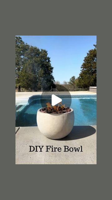 Morgan Winton on Instagram: "DIY Fire Bowl! I was so excited to try this one!! And it was soooo easy to make!  All you need is a concrete planter, soil, torch canisters, and lava rocks! First, pour your soil in the planter. I mainly used the soil to get my torch canisters close to the top  of the planter but you could also use lava rocks for this!  Next, add your torches. I used 5 total. Lastly, pour lava rocks around the torches.  And that’s it! 😍 So cozy and relaxing!  Also, Comment OUTDOOR and I’ll send you links to everything I used.  **Make sure to detach your caps from your torch canisters and keep those so you can put the fire out when you’re done.   #outdoorspace #backyardoasis #backyarddesign #outdoordecoration #patiodecor #porchdecor #outdoorliving #outdoordiy #easydiy #diydecor Diy Lava Rock Fire Pit, Fire Bowls Around Pool, Flower Pot Fire Pit Diy, Lava Rock Planters, Diy Planter Fire Bowl, Fire Pots By Pool, Diy Fire Bowls Outdoor Pool, Diy Tiki Torch Fire Bowl, Pool Fire Bowls