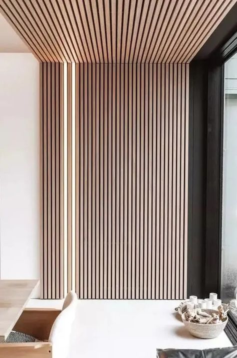 a minimalist space with a wooden slat accent wall that extends up the ceiling and built in lights right in this wall Slat Wall Stairwell, Slat Accent Wall, Minimalist Space, Wood Slat Wall, Wood Accent Wall, Vegas Baby, Wood Ceilings, Slat Wall, Wooden Slats