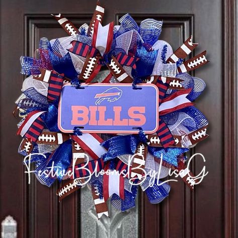 For the Bills Mafia Fans, a hand-crafted Buffalo Bills Wreath. With red and blue ribbons with an accentuated Bills NFL license plate, this wreath is sure to brighten up your game day festivities. Buffalo Bills Christmas, Buffalo Bills Stuff, Ribbon Wreaths, Bills Mafia, Sports Wreaths, Football Decorations, Rochester New York, Ribbon Wreath, Wreath Front Door