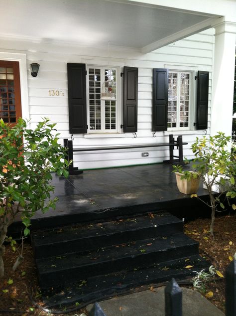 joggling board and love the glossy black porch floor Porch Floor Colors, Joggling Board, Front Porch Steps, Concrete Patio Makeover, White Porch, Dallas House, Front Porch Makeover, White Exterior Houses, Porch Paint