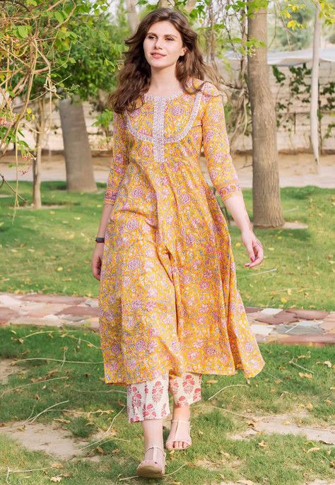 Printed Cotton A Line Kurta Set in Yellow A Line Kurti, Lace Dress Design, Simple Kurta Designs, Simple Kurti Designs, Casual Indian Fashion, Long Kurti Designs, Pakistani Dresses Casual, Kurta Neck Design, Cotton Kurti Designs