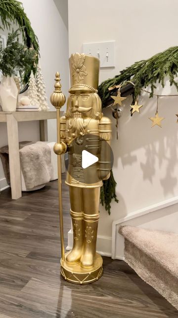 Jeanny Sánchez on Instagram: "POV: We painted the nutcrackers in color metallic gold and we love it! 🤩🎄🎁🫶🏻  The real thing is…. NOW I want to use them inside. Not in my front porch lol. Help me decide. Love how it looks this one in my entryway. 🥹  These Christmas nutcrackers are so affordable! $60 each 😍 I linked everything, also the spray!  Comment SHOP to receive the links 🔗   Save and share for Christmas decor ideas 🎄  Follow @jeanny.myneutralhome for home decor inspiration 🎄  https://liketk.it/4Y77l  #christmas #nutcrackerhomedepot #nutcrackers #nutcracker #homedecor #christmasdecor #goldchristmas #whitechristmas #modernchristmas #nutcrackerdiy #christmasdiy   Gold nutcracker diy, home decor ideas for Christmas, gold and white Christmas decorations, entryway Christmas decor, Gold Nutcracker Diy, Christmas Decorations Entryway, Christmas Gold And White, Nutcracker Makeover, Nutcracker Diy, Entryway Christmas Decor, Gold Nutcracker, Decor Ideas For Christmas, White Christmas Decorations