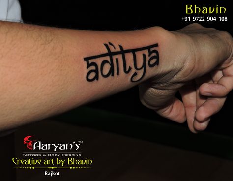 Aaryans Tattoos In Rajkot..  #NameTattoo.. #Aditya #HindiStyle #FontTattoo #Aaryans #RajkotStudio #ArtByBhavin #wristTattoos #SmallTattoos #Tattooing #LoveTattoo #darkTattoo #India #Artist #TattooLover..  Call : 9722 904 108  Done BY @bhavinTattooist Aditya Name Tattoo, Aditya Name, Name Tattoo On Hand, Tattoo On Hand, Dog Memorial Tattoos, Hand Images, Latest Mehndi, Name Tattoo Designs, Background Images For Quotes