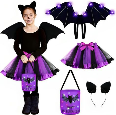 Kids' Bat Costume Set for Halloween. Includes wings, bat ears, a purple skirt, and a light-up bag. Made of comfy materials. Eye-catching purple color. Good for Halloween and dress-up fun. Kids Bat Costume, Wing Ears, Halloween Bat Costume, Kids Bat, Purple Tulle Skirt, Bats For Kids, Bat Ears, Bat Silhouette, Bat Costume