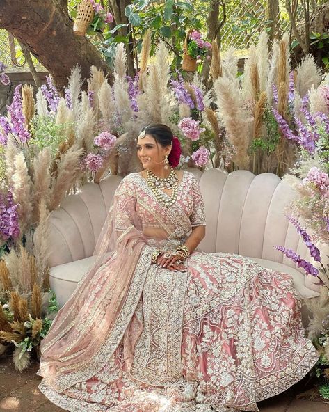 #Trending: Matching The Bridal Mehendi Seating To The Lehenga! Peach Pink Bridal Lehenga, Pastel Pink Bridal Lehenga, Lehenga Ideas, Peach Lehenga, Bridal Lehenga Designs, Salmon Pink Color, Saree Lehenga, Indian Wedding Planning, Pink Lehenga