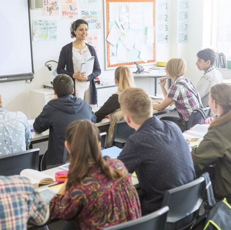 Teacher and students in classroom during lesson