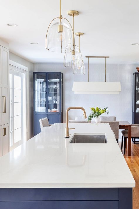 Pendant Lights Over Navy Kitchen Island, Light Fixtures Above Island, Gold Light Fixture Kitchen Islands, Timeless Kitchen Island Lighting, Contemporary Island Lighting, Transitional Lighting Fixtures Kitchen, Light Fixture Above Island, Wood Floor Gray Walls, Lighting Cathedral Ceiling