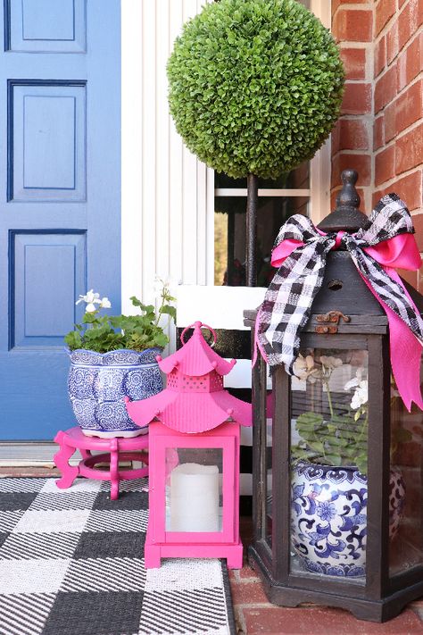 SPRING 2020 HOME TOUR PART 1- PORCH, ENTRY, AND DINING ROOM Preppy Front Door, Grandmillenial Outdoor Patio, Pink And Blue Patio Decor, Pink Front Porch Ideas, Purple Porch Decor, Preppy Front Porch, Grandmillenial Porch, Large Lanterns On Front Porch, Lantern On Front Porch