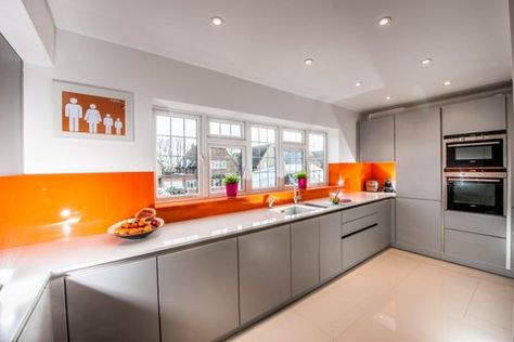 Orange splash back. Love my kitchen! Orange And Grey Kitchen Ideas, Orange Apartment, Grey Kitchen Ideas, White Kitchen Units, Wood Shelves Kitchen, Orange Splash, Orange Kitchen Decor, Grey Blue Kitchen, Kitchen Renovation Inspiration