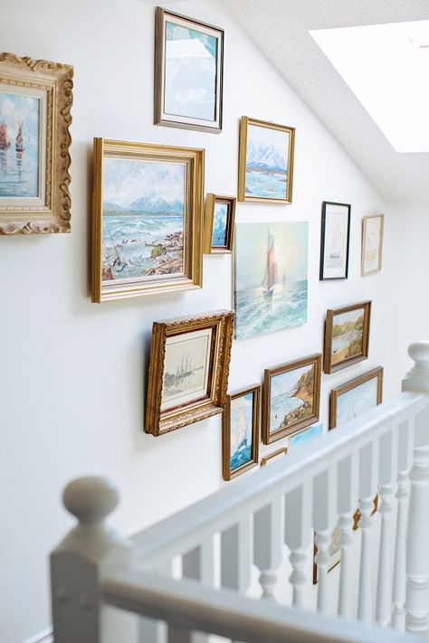 Frame Wall Staircase, Coastal Collage Wall, Framed Paintings On Wall, Wood Frame Gallery Wall, Staircase Artwork, Watercolor Gallery Wall, Gold Frame Gallery Wall, Coastal Gallery Wall, Farmhouse Gallery Wall