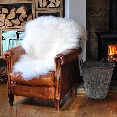 20 Unexpected Ways To Use Sheepskin | Domino Mid Century Leather Chair, White Leather Chair, Sheepskin Chair, Best Leather Sofa, Sheepskin Throw, Nursery Chair, Chair Makeover, Couch Set, Leather Couch