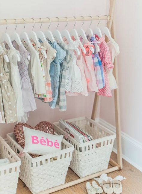 Organizing baby's clothes without a  closet is easier than you think. Find out how to organize baby clothes without a closet in the baby's nursery. Diy Kast, Kids Clothes Storage, Diy Clothes Storage, Blush Pink Nursery, Monika Hibbs, Baby Nursery Closet, Clothes Shelves, Baby Closet Organization, Baby Clothes Storage