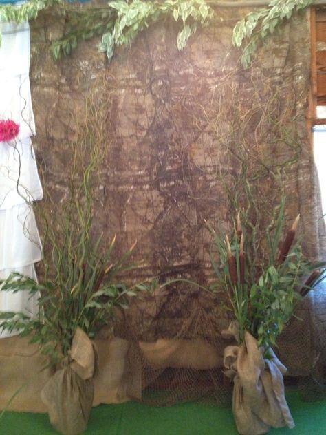 The Groom had a hunting theme backdrop with 6' willow trees and cattails. Camoflauge Party Decorating Ideas, Hunting Backdrop, Duck Hunting Birthday Party Decorations, Wild Game Dinner Decorations, Duck Hunting Decorations, Hunting Birthday Party Decorations, Wild Game Dinner, Hunting Birthday Party, Camo Birthday Party