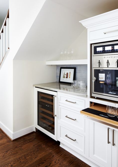 A Wine Station Under Stairs Bar, Sleek Kitchen Design, Wine Station, Pantry Renovation, Space Under Stairs, Wine Dispenser, Small Sink, Glass Front Cabinets, Gorgeous Tile