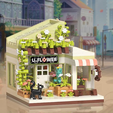 PRICES MAY VARY. 【Modern Design】This small flower shop building block set is designed for creative city street scenes, featuring a modern and minimalist urban storefront. By adding this Floral Boutique adorned with colorful blooms to your modular city, you introduce a sense of community and greenery to the urban landscape. This friend house building kit is suitable for both office and home settings, bringing a fresh style and decoration to any space. 【Details Unveiled】Each block in the mini flow Cute Architecture, Mini Building, Green House, Building Block, Flower Shop, Lego, Building