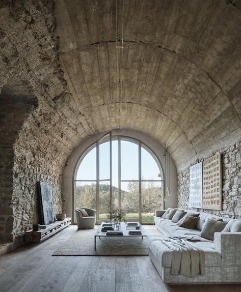 Living area features a tall, barrel-vaulted ceiling and original stone walls in this renovated 17th-century farmhouse near Barcelona. [1319 × 1600] - Imgur Vault Ceiling, Barrel Vault, Spanish Farmhouse, Cozy Apartment Living Room, Barrel Vault Ceiling, Farmhouse Renovation, Pergola Design, Modern Architects, Modern Cottage