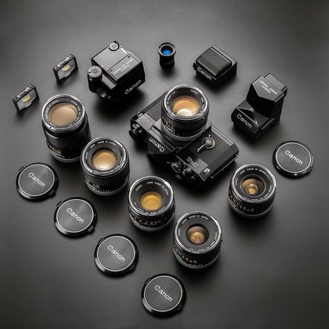 This is another favorite shot of mine. The Canon F1 with different finders, focusing screens and a bunch of chrome nose FD lenses. This is… Canon F1, System Camera, 35mm Camera, Camera Lenses, Vintage Cameras, F 1, Camera Lens, Film Photography, The Old