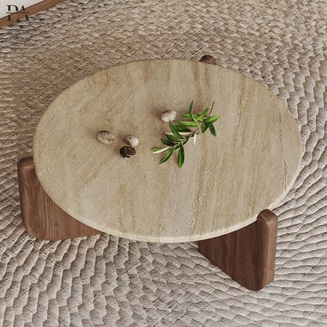 Embrace the enduring beauty of natural textures with the Travertine Coffee Table. Handcrafted from solid wood and featuring a unique travertine top, this piece strikes a captivating balance between modern form and organic materiality. The table's clean lines and rounded corners allow the natural veining and subtle imperfections of the travertine to take centre stage, adding a touch of timeless elegance to your living space. Imagine placing it in your living room, adorned with a ceramic vase and Travertino Coffee Table, Round Travertine Coffee Table, Organic Modern Coffee Table, Living Room Round Table, Coffee Table Organic, Travertine And Wood, Table Travertin, Unique Coffee Table Design, Organic Coffee Table