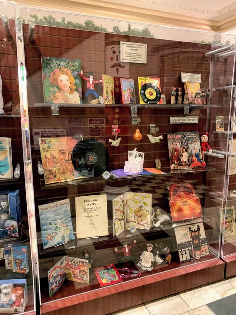 This year the theme of our holiday decorations at the Piqua Public Library are The Nutcracker and other Christmas Stories. This display case is full of music, books and ornaments related to the Twelve Days of Christmas. Do you have a favorite Christmas or other winter holiday story? Glass Display Case Ideas, Library Display Case Ideas, Display Case Ideas, November Books, Christmas Stories, Library Display, Holiday Stories, Glass Display Case, Case Ideas