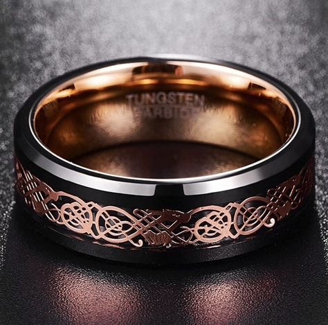 Looking for mens alternative wedding rings? Look no further than this beauty, in eye-catching rose gold and black tungsten. #weddingring #rings #mensjewelry #mensjewellery #mensrings #weddingrings Gold Tungsten Wedding Bands, Tungsten Jewelry, Alternative Wedding Rings, Celtic Dragon, Golden Dragon, Rose Gold Accents, Black Tungsten, Tungsten Carbide Rings, Ring Wedding Band