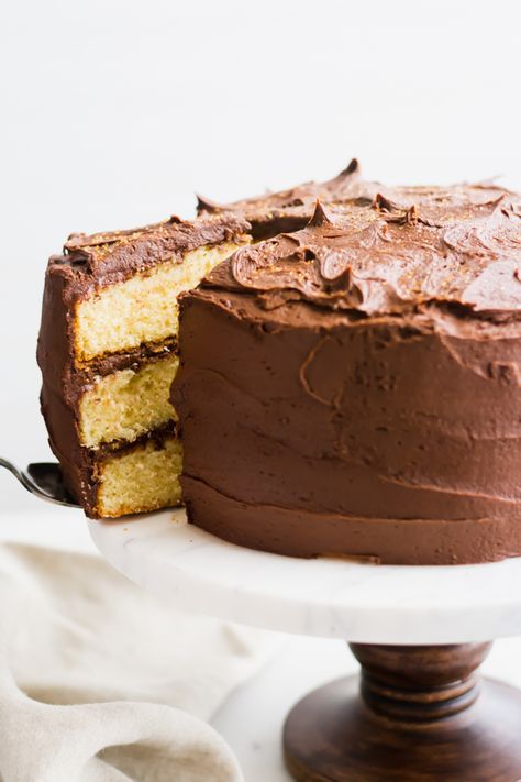 The Best Yellow Cake with Chocolate Frosting - This is our favorite yellow cake! It's 3 layers tall, light and fluffy, and covered in the most creamy chocolate frosting. Perfect for any celebration! #cake #dessertrecipes #chocolate #celebration #birthdaycake #chocolate #frosting #cake | bluebowlrecipes.com 3layer Cake, Best Chocolate Icing, Yellow Cake Chocolate Frosting, Yellow Cake With Chocolate Frosting, Yellow Butter Cake, Chocolate Cake Frosting, Cake With Chocolate Frosting, Moist Yellow Cakes, Frosting Chocolate