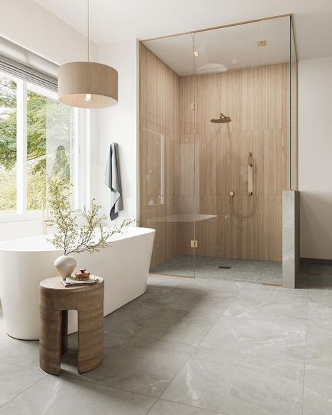 Edward Martin | Talk about a master bath! This one took neutrals to another level. The wood-look tile shower, marble-look floor, and elongated subway tile... | Instagram