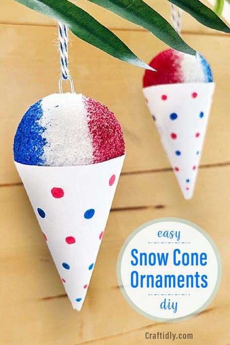 Two DIY snow cone ornaments made with paper for the cup and foam for the top. Painted in colorful red, white and blue. Also a craft to make for 4th of July, Christmas in July or make them in different colors to decorate tree at Christmas. Snow Cone Craft, Winter In July Crafts For Kids, Summer Ornaments For Tree, Patriotic Ornaments Diy, Christmas In July Decorations Diy, Christmas In July Kids Crafts, Christmas In July Ornaments, Christmas In July Activities For Kids, Christmas In July Ideas