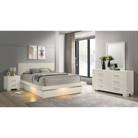 This deluxe 4-piece bedroom set from the Jessica collection includes a dresser and nightstand. The stately bed is crafted in a platform style with smooth lines and crisp edges. Modern Bedroom Sets Furniture, White Bedroom Set Ideas, Pedestals Bedroom, Pedestal Bed, Modern Bedroom Furniture Sets, Dresser And Nightstand, Matching Dressers, White Bedroom Set, Platform Bedroom