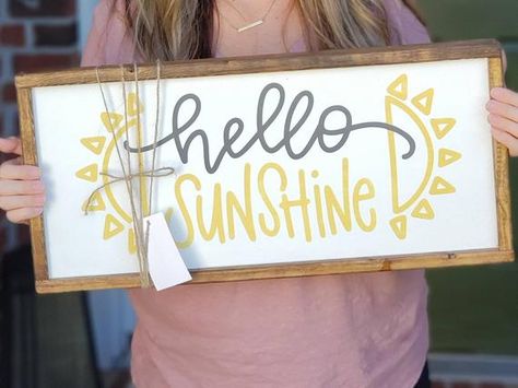 This Hello Sunshine sign is perfect way to brighten your day!  Details: - Approximately 11 x 23 x 1 - Hand painted lightweight wood - Framed in rustic pine - Colors as shown, Gray and Yellow letters with Antique White background, may be slightly distressed - 100% Paint, not vinyl  All signs are Hello Sunshine Sign, Sunshine Sign, Sunshine Wall Art, Above Bed Wall Art, Yellow Letters, Wall Art Yellow, Wood Block Crafts, Yellow Sign, Sunflower Gifts