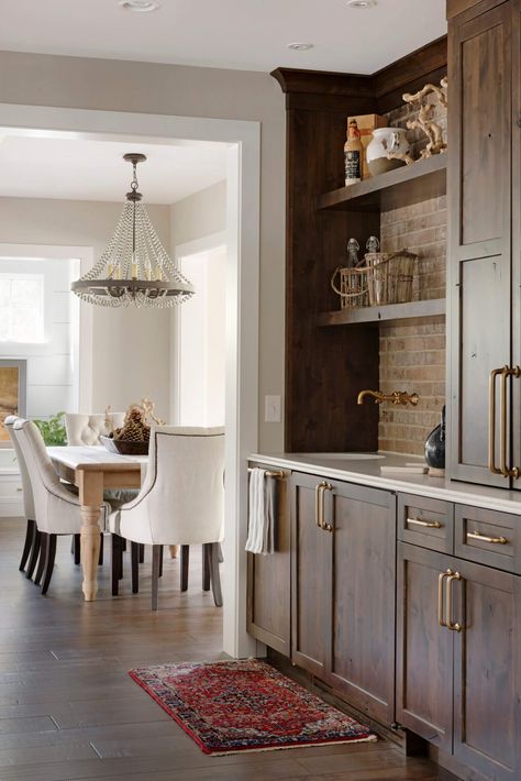 https://www.durasupreme.com/inspiration_gallery/tri-color-minnesota-dream-kitchen/?popup=true Knotty Alder Kitchen, Farmhouse Transitional, Wood Entertainment Center, Staining Cabinets, Knotty Alder, Rustic Bar, Entertainment Area, Studio M, Cabinetry Design