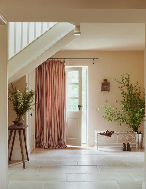 An interior designer's clever conversion of a farm outbuilding into an elegant, unfussy country house | House & Garden Calming Paint Colors, Breeze Block Wall, Wrought Iron Bed, Clay Roof Tiles, Clay Roofs, Agricultural Buildings, Paint And Paper Library, Limestone Flooring, Warm Palette