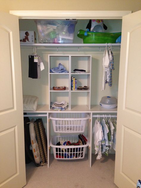 Nursery Closet; my husband built this closet in just a few hours. We modified the plans by leaving the original single closet shelf in order to maximize storage space. We bought all of the materials from Lowe's and the laundry baskets from Walmart. The original idea and plans came from this website: http://happykidsidea.com/2013/03/09/closet-organization-love-the-built-in-slots-for-laundry-baskets-better-than-a-clothes-hamper-kids-can-sort-their-lights-and-darks-grab-a-basket-to-wash-when-full/ Kids Laundry Basket Ideas, Shared Closet Organization Husband, Townhome Ideas, Kids Laundry Basket, Closet Spaces, Closet Redo, Shared Closet, Nautical Room, Closet Shelf