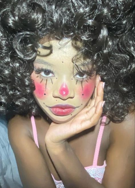 Pink And White Clown Makeup, Wierd Make Up, Clown Makeup Dark Skin, Pink And Black Clown Makeup, Victorian Clown Makeup, Coquette Clown Makeup, Clown Makeup Without White Face, Pink And Blue Clown Makeup, Light Clown Makeup