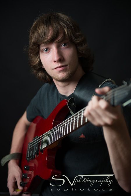 A Grad and his Guitar - Steven Vandervelde Photography Senior Picture Ideas For Guys With Guitar, Guitar Senior Pictures Boys, Black Background Pictures, Senior Year Checklist, Guitar Senior Pictures, Guitar Photoshoot, Year Checklist, Guitar Portrait, Senior Photos Boys