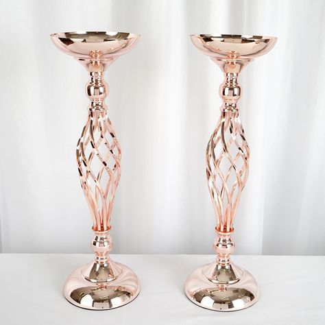 [About] Quantity: 2 Candle Holders Color: Blush/Rose Gold Material: Metal Overall Height: 20" Top Diameter: 6" Base Diameter: 6" Click here for our Candles Collection Click here for our Flower Balls Collection [Information] Additional Information: Perfect for Birthday, Wedding, Party, Table Decoration, Event Decoration, Centerpieces, Candle holder Note: Decorations Not Included Uses: Flower Ball Stand, Table Top Candle Holder, Fire Place Candle Holder, Wedding Centerpiece Candle Holder, Christma Tall Metal Candle Holders, Pink Weddings, Candles In Fireplace, Candle Wedding Centerpieces, Tall Candle Holders, Flower Candle Holder, Quinceanera Themes, Pedestal Stand, Candle Holders Wedding