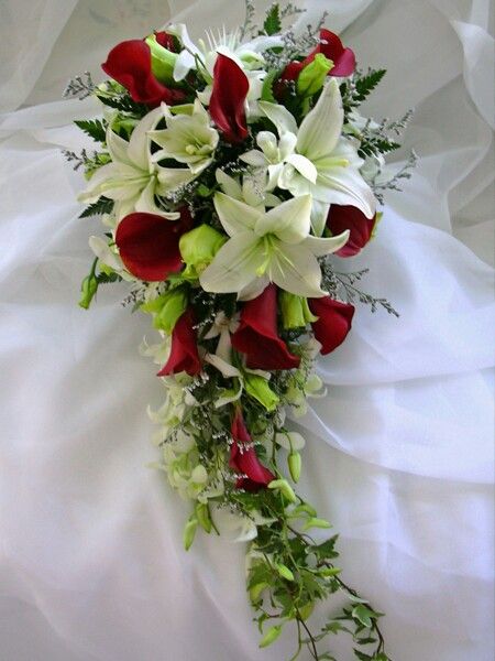 Traditional . I  make this Cascading bouquets in any color of accenting callas or roses, size according to need. Wedding Wows, Prom Corsage, Cascading Wedding Bouquets, Winter Wedding Bouquet, Winter Wedding Flowers, Cascade Bouquet, Brooch Bouquets, White Bouquet, Bride Bouquets