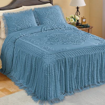 Soft and luxurious, this beautiful chenille bedspread has an intricate texture and a gorgeous design. It features an exquisite diamond medallion pattern in the centre with a scrolling design in the corners. A great way to add a touch of elegance to your bedroom, the skirt drapes to the floor with a striped texture that's finished with delicate fringe. Shams are sold separately. Machine wash. Cotton; imported. Choose White or Dusty Blue. Available in: Twin (108" x 80"), Full (110" x 96"), Queen ( Top Of Bed, Chenille Bedspread, Medallion Pattern, Collections Etc, Bedding Stores, Coverlet Set, Home Decor Store, House Of Hampton, Quilt Bedding