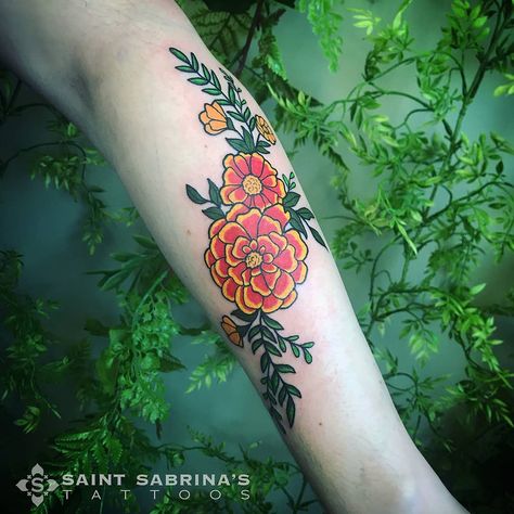 Photo by (inkeatererin) on Instagram | #marigold #marigoldtattoo #flowertattoo #floraltattoo #tattoo #armtattoo #femaltattooartist #femaleartist #colortattoo #brightandboldtattoo #colorfultattoo #minneapolisartist #mplstattooartist #mntattooers #minnesota #minneapolis #saintsabrinas #twincities Marigold Tattoo, Aesthetic Tattoo Ideas, Medium Size Tattoos, Carnation Tattoo, 15 Aesthetic, Mexican Tattoo, Traditional Tattoo Flowers, Floral Tattoo Sleeve, Flower Tattoo Sleeve