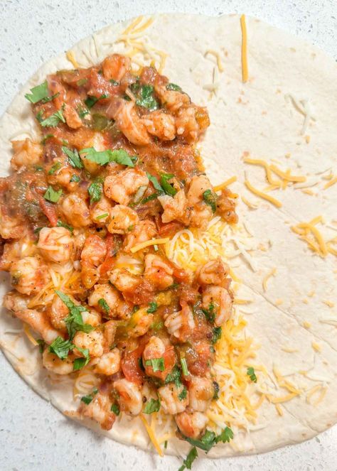 Cajun Shrimp Quesadilla Recipe - The Effortless Cook Cajun Quesadilla, Shrimp Quesadilla Recipe, Shrimp And Crawfish, Shrimp Quesadilla, Tomatoes And Cheese, Cooking Onions, Sauteed Peppers, Quesadilla Recipe, Cheese Quesadilla