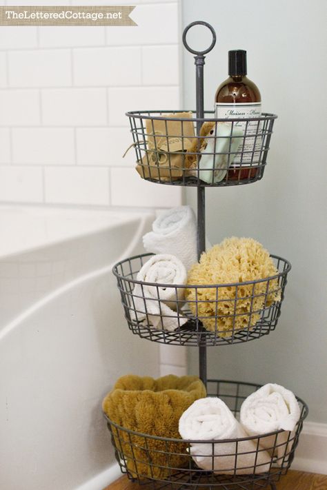 Fruit basket storage bathroom Bathtub Surround, Pretty Bathrooms, Metal Basket, Cottage Bathroom, Small Bathroom Storage, Hus Inspiration, Bathroom Spa, Bathroom Redo, Tiny Bathroom