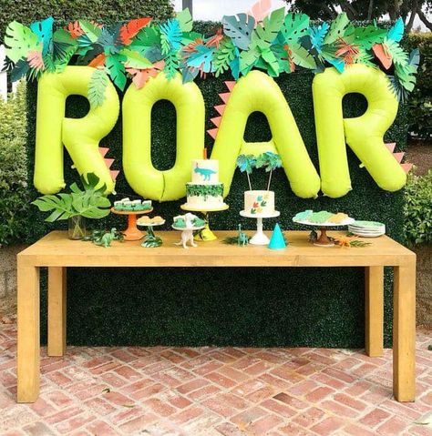 Plant Wall Backdrop, Dinosaur Birthday Theme, Dinosaur Birthday Party Decorations, Dinosaur Themed Birthday Party, Artificial Plant Wall, Dino Birthday Party, Dinosaur First Birthday, Design Showroom, Dinosaur Theme Party