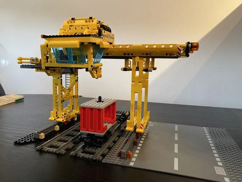 Container Terminal is a crane facility often seen at ports or large railroad stations. It enables the transfer of containers from rail to trucks and ... Lego Crane, Lego City Train, Lego Train Tracks, Container Terminal, Lego Boat, Lego Wheels, Lego Table, Lego Trains, Lego Technic